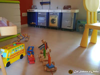 Photos of the common areas of Cal Sabater d'Ordis, dining room, kitchen, entrance hall, games room